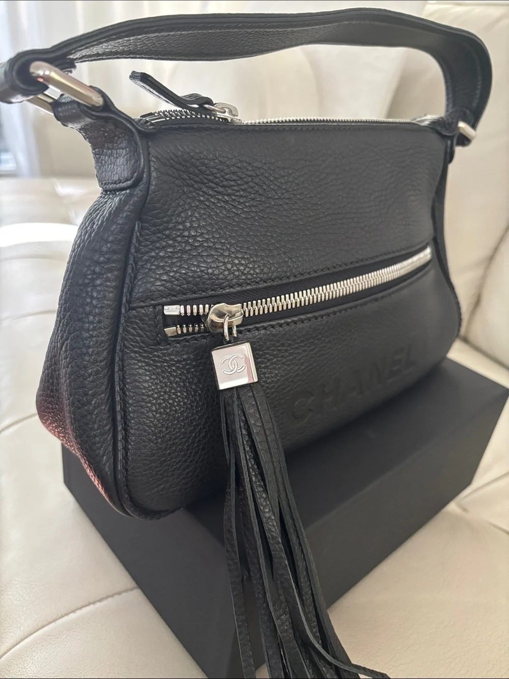 CHANEL Black Pebbled Leather Shoulder Bag with Tassel Zip